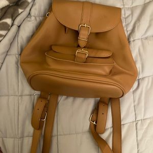 Brown leather backpack